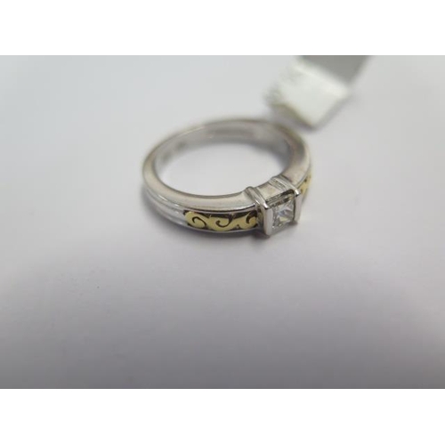 89 - An 18ct white gold ring with yellow gold on shoulders ring size M - diamond weight approx 0.25ct - e... 