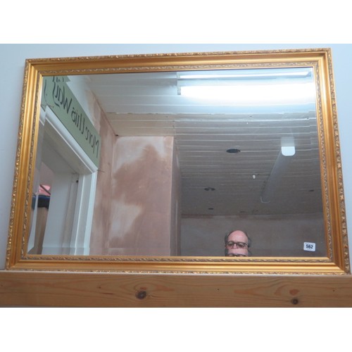 562 - A modern gilt mirror - 103cm x 72cm - in good condition