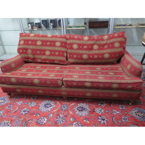 584 - A modern sofa in sun motif fabric - Width 210cm x Height 81cm x Depth 108cm - in good condition