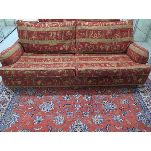 583 - A modern sofa in Egyptian motif fabric - Width 210cm x Height 81cm x Depth 108cm - in good condition