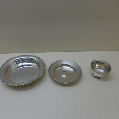 106 - A silver coaster - Width 16cm - a silver Armada dish and a small silver dish - total weight approx 1... 