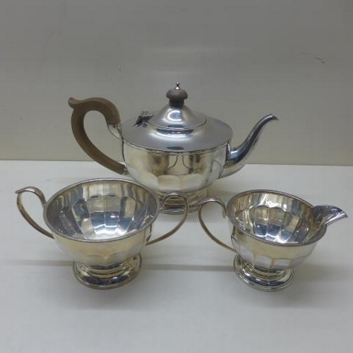 115 - A silver three piece tea set Birmingham 1931/32 - some rubbing to hallmarks on teapot otherwise good... 