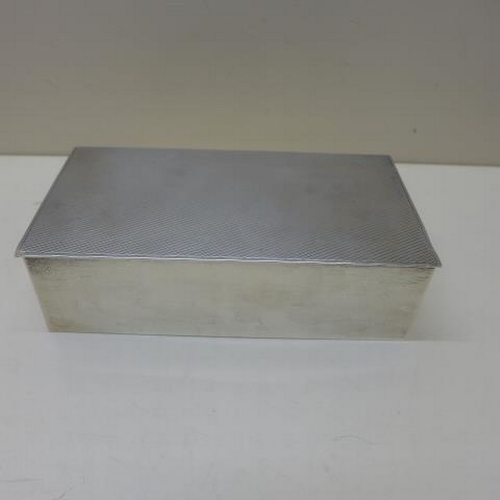 119 - A Goldsmiths and Silversmiths silver desk box London 1936/37 - Width 17cm - slight bending but gener... 