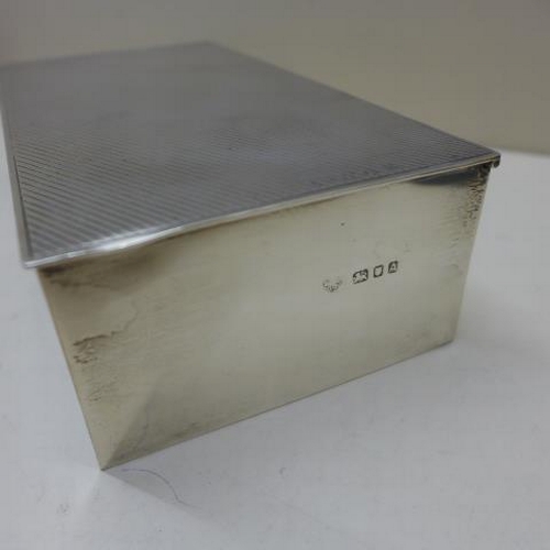 119 - A Goldsmiths and Silversmiths silver desk box London 1936/37 - Width 17cm - slight bending but gener... 