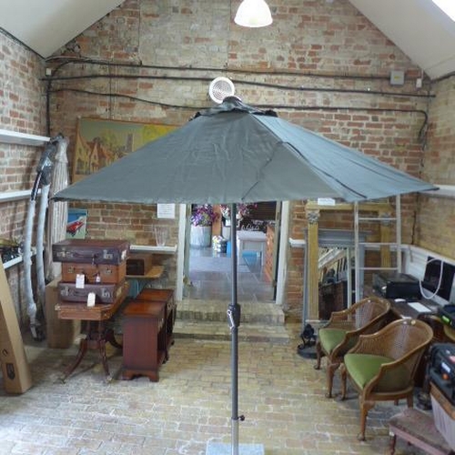 261 - A Four Seasons new boxed parasol - RRP £129 - free postage on this item