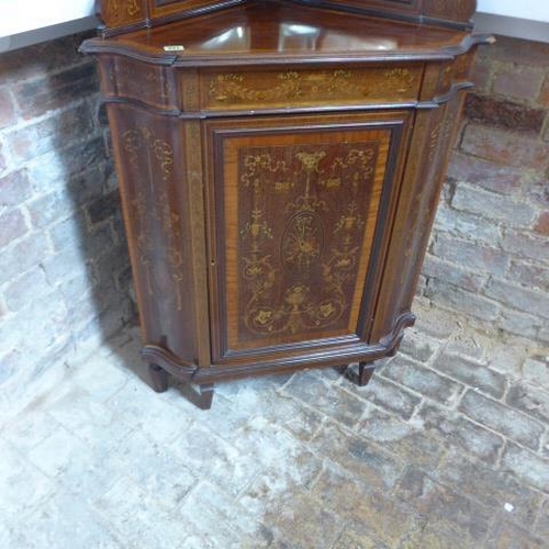 271 - A good quality Edwardian mahogany and inlaid corner cabinet with a bow fronted glazed door