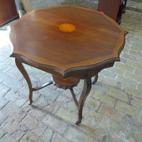 272 - An Edwardian mahogany and inlaid window table