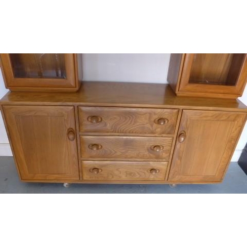 273 - An Ercol Windsor living cupboard - as new - Width 160cm x 160cm - retails online at £3,429