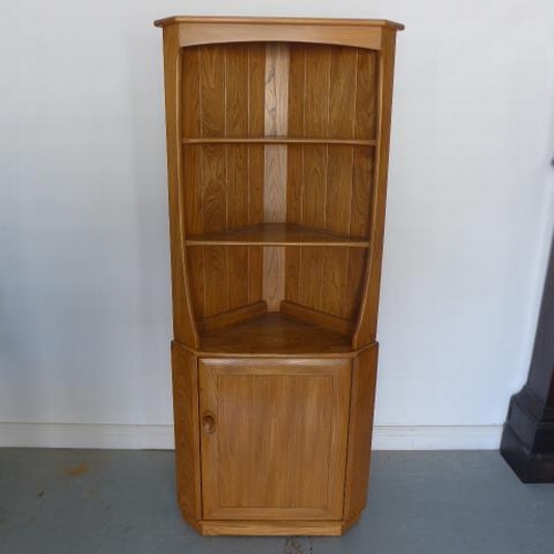 274 - An Ercol Windsor corner cabinet - as new - retails online around £2,000