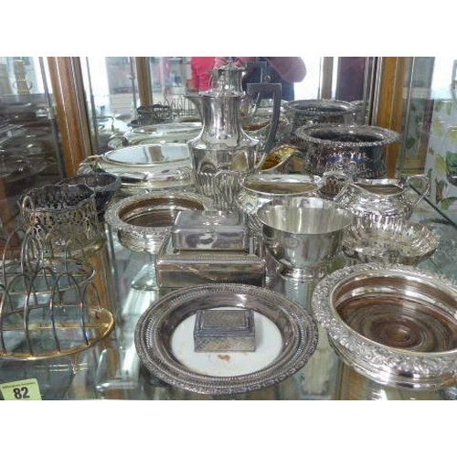 82 - A collection of assorted silver plated ware including coasters