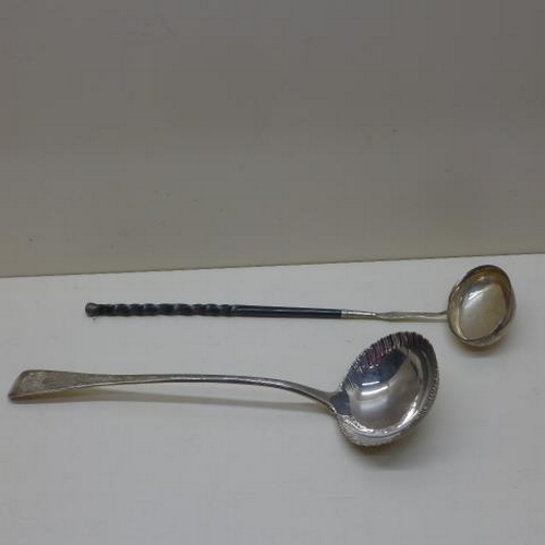 91 - A silver ladle 3cm long - approx weight 5.5 troy oz and a punch ladle