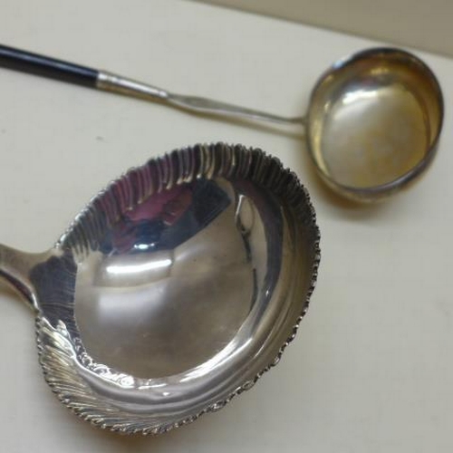 91 - A silver ladle 3cm long - approx weight 5.5 troy oz and a punch ladle