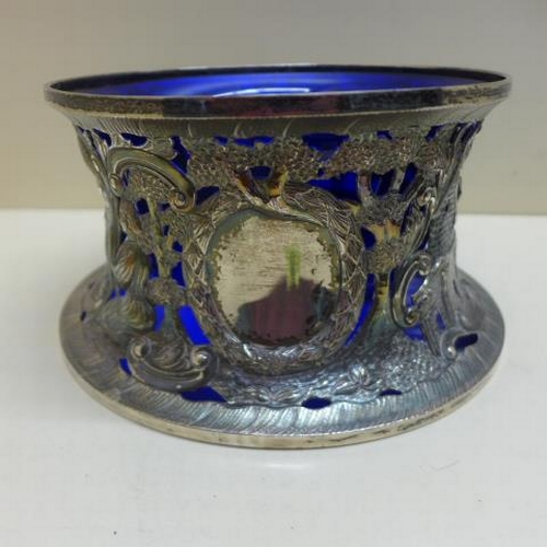 96 - An Irish silver Shepard and Shepardess fretwork silver sleeve with blue glass liner - Dublin 1932, T... 