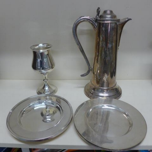 99 - A large plated lidded flagon - Height 35cm - a plated goblet, two plated dishes - Diameter 21.5cm - ... 