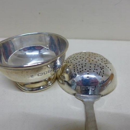 88 - A pair of silver salts boxed and two silver strainers, one with dish and a silver napkin ring - tota... 