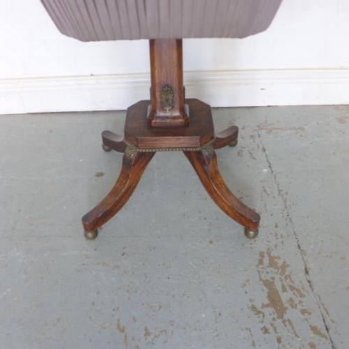 569 - A 19th century rosewood sewing box with brass fittings