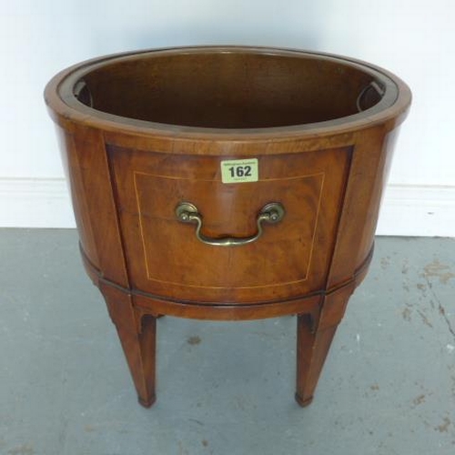 580 - A 19th century oval mahogany and inlaid wine cooler with a brass liner - Width 38cm x Height 46cm