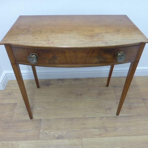 577 - A 19th century mahogany bow fronted side table with a single drawer - Width 86cm x Height 78cm