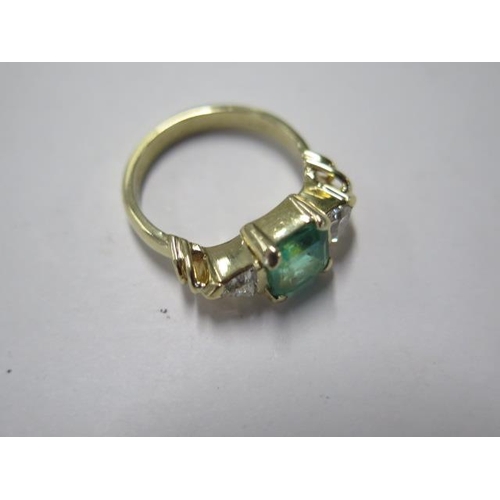 72 - An 18ct yellow gold emerald and trillion cut diamond ring - emerald approx 1.5ct, emerald is a good ... 