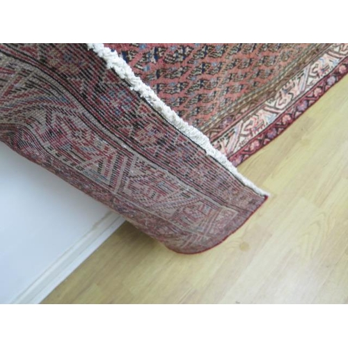 503 - A hand knotted woollen Araak rug - 2.05m x 1.22m