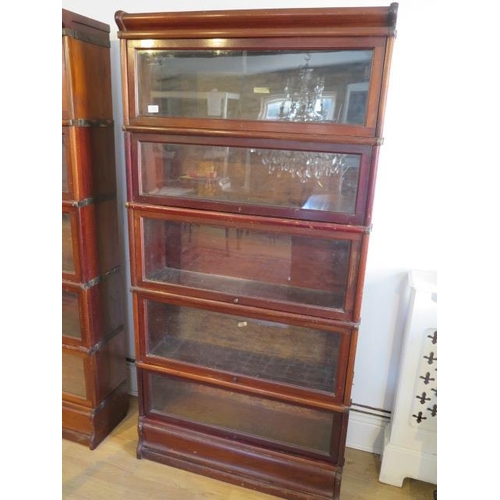 599 - A mahogany five section glazed Globe Wernicke stacking bookcase one with label, all glass intact, th... 