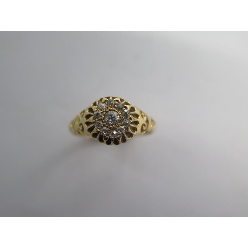 101 - An 18ct yellow gold hallmarked diamond cluster ring size P - approx weight 5 grams - good condition