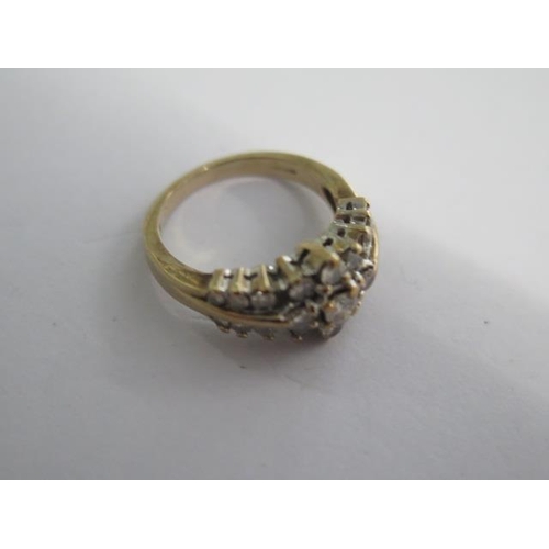 102 - A hallmarked 9ct yellow gold diamond cluster ring size N - approx weight 5 grams - in good condition