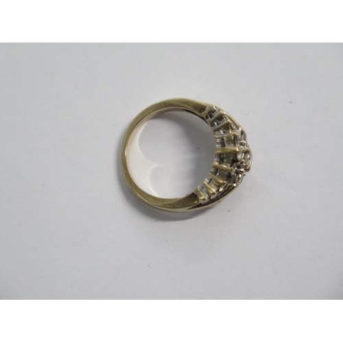 102 - A hallmarked 9ct yellow gold diamond cluster ring size N - approx weight 5 grams - in good condition