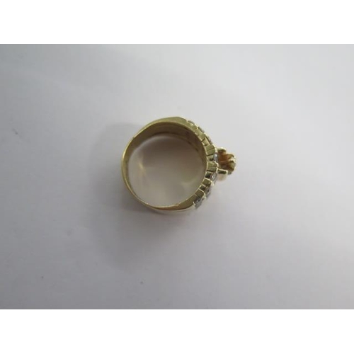 103 - A yellow gold diamond ring size K - 12mm tall - approx weight 8.2 grams - surface tests to approx 18... 