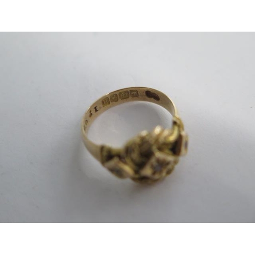 109 - An 18ct yellow gold ring size J/K set with three small diamonds - approx weight 5.5 grams - generall... 