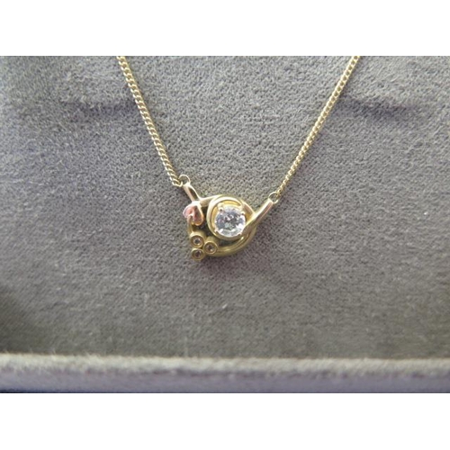 117 - A gold Clogau white topaz pendant on chain - approx weight 3 grams - ex jewellers stock in as new co... 