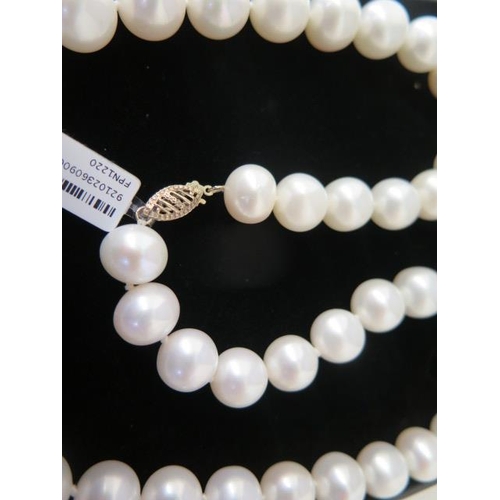 118 - A one strand white pearl necklace - Length 51cm - pearls approx 10mm - ex jewellers stock in as new ... 