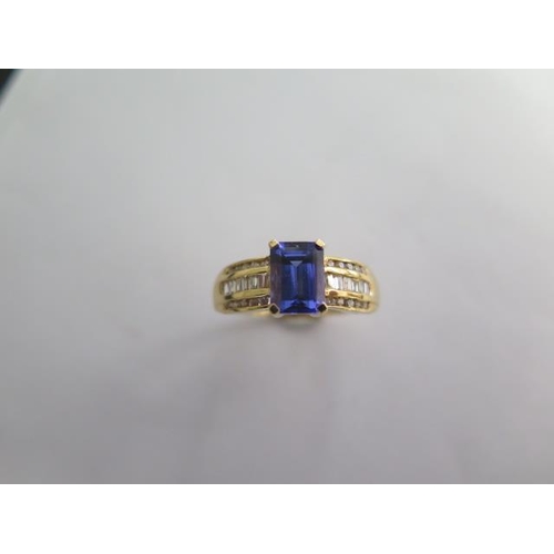 123 - An Iliana 18ct yellow gold AAA Tanzanite and diamond ring - Tanzanite 1.75ct - ring size O/P -approx... 