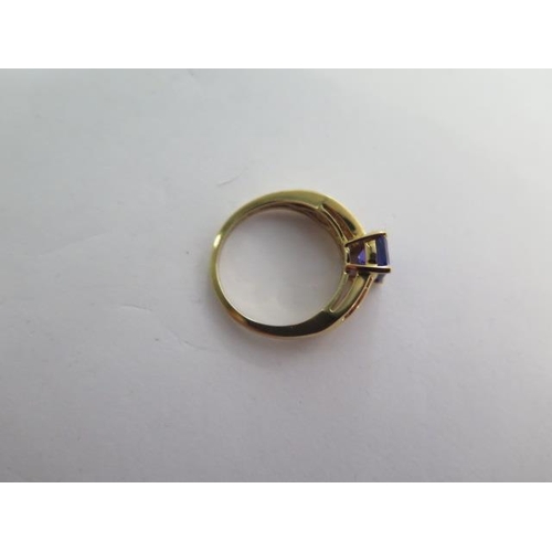 123 - An Iliana 18ct yellow gold AAA Tanzanite and diamond ring - Tanzanite 1.75ct - ring size O/P -approx... 