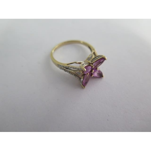 126 - A 9k Ceylon purple sapphire and diamond gold ring size R - approx weight 3.5 grams - almost unworn c... 