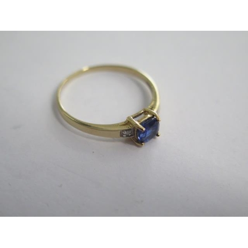 133 - A 9k Tanzanite and diamond yellow gold ring size R/S -approx weight 1.2 grams - almost unworn condit... 