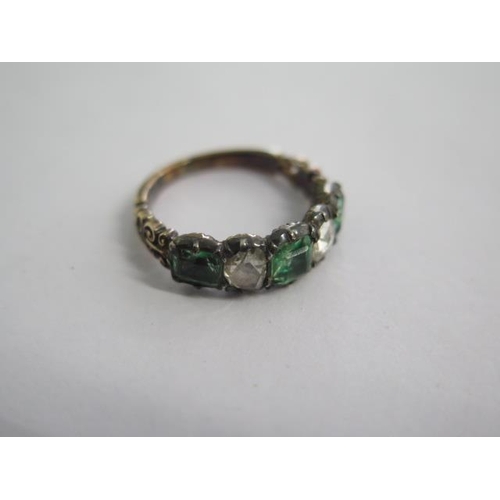 142A - An old cut five stone emerald and diamond yellow metal ring possibly 19th century - centre stone app... 