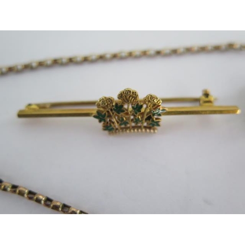 143 - A gilt metal pendant on a 9ct chain and three 9ct brooches - total approx weight 14 grams