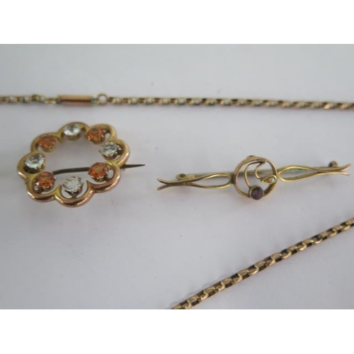 143 - A gilt metal pendant on a 9ct chain and three 9ct brooches - total approx weight 14 grams