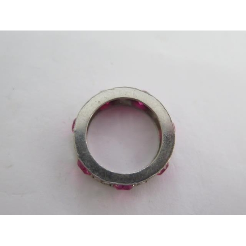 143A - A white metal red stone ring possibly ruby - ring size K - approx weight 5.8 grams - generally good