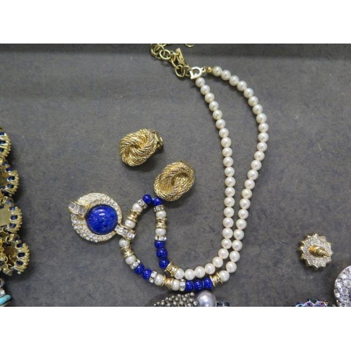 150 - An assortment of costume jewellery including Christian Dior