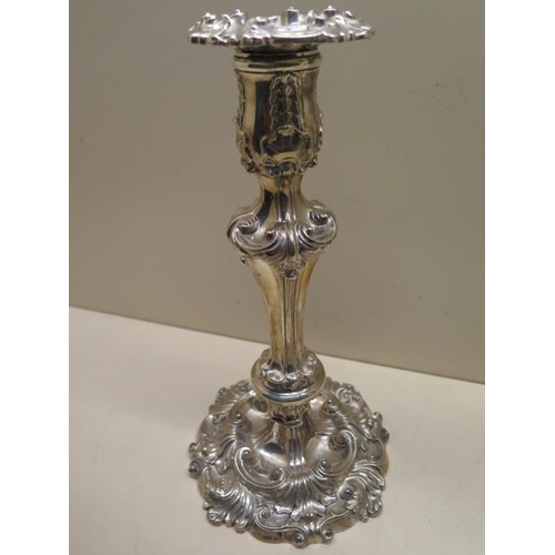 159 - A pair of ornate embossed weighted silver candlesticks - Height 28cm - Sheffield Waterhouse Hodson &... 