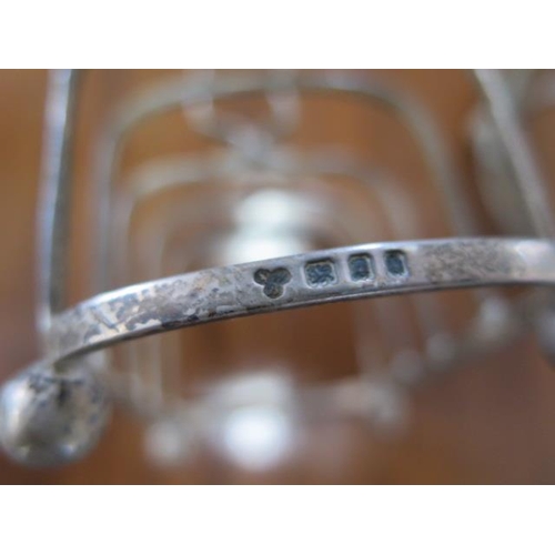 187 - Two silver toast racks - Largest 13cm long - total weight approx 7.7 troy oz - smaller has some bend... 