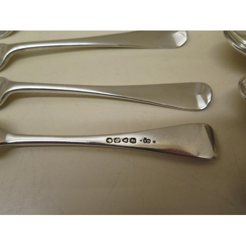 191 - A collection of assorted silver flatware forks and spoons and a pair of nips including four GA forks... 