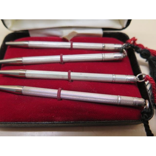 196 - A Sterling silver bridge pencil set - each 8cm long