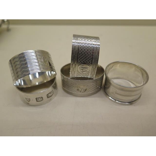 199 - A Walker and Hall silver tea caddy - some bending - five silver napkin rings - all good and a silver... 