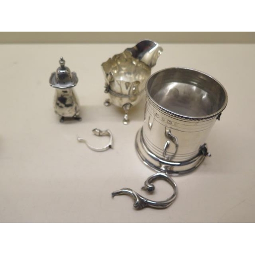 199 - A Walker and Hall silver tea caddy - some bending - five silver napkin rings - all good and a silver... 