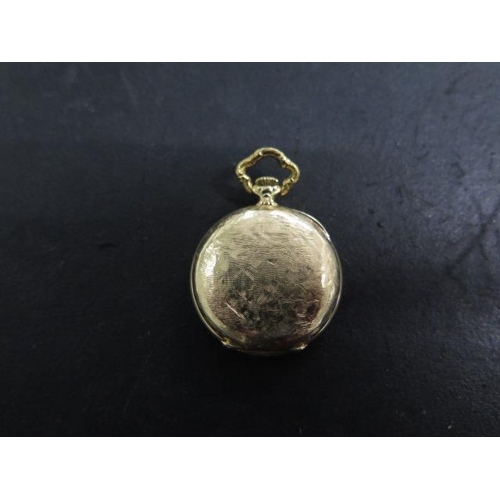 203 - A 14ct yellow gold Waltham top wind pocket watch - 36mm case, gold dust cover, approx weight 40 gram... 