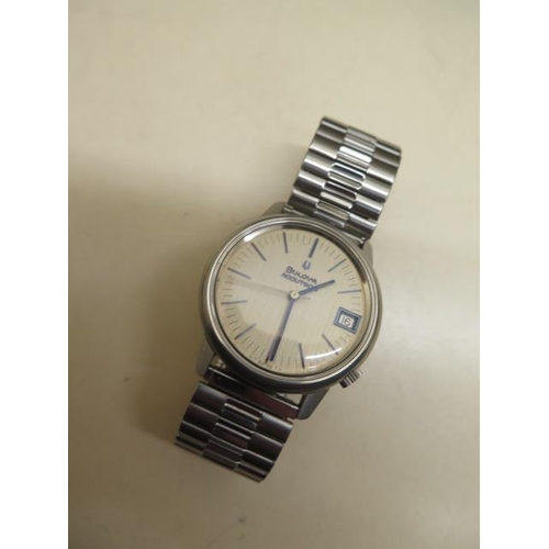 214 - A Bulova Accutron date stainless steel gents wristwatch - 34mm case - not currently running, with bo... 