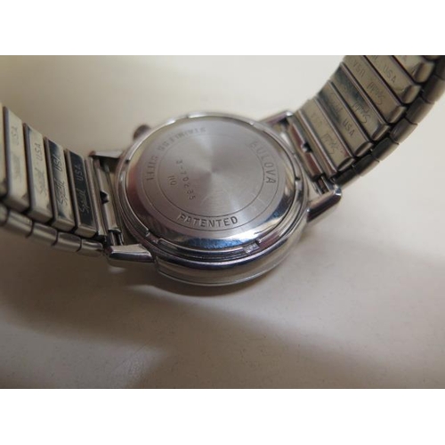 214 - A Bulova Accutron date stainless steel gents wristwatch - 34mm case - not currently running, with bo... 